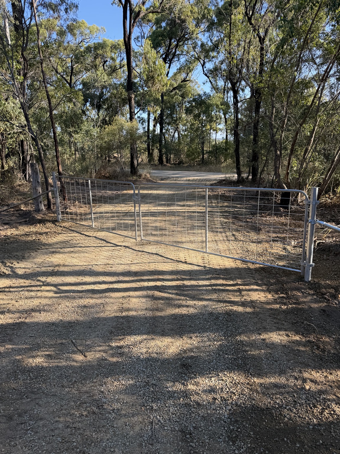 Cleared access through a wooded property