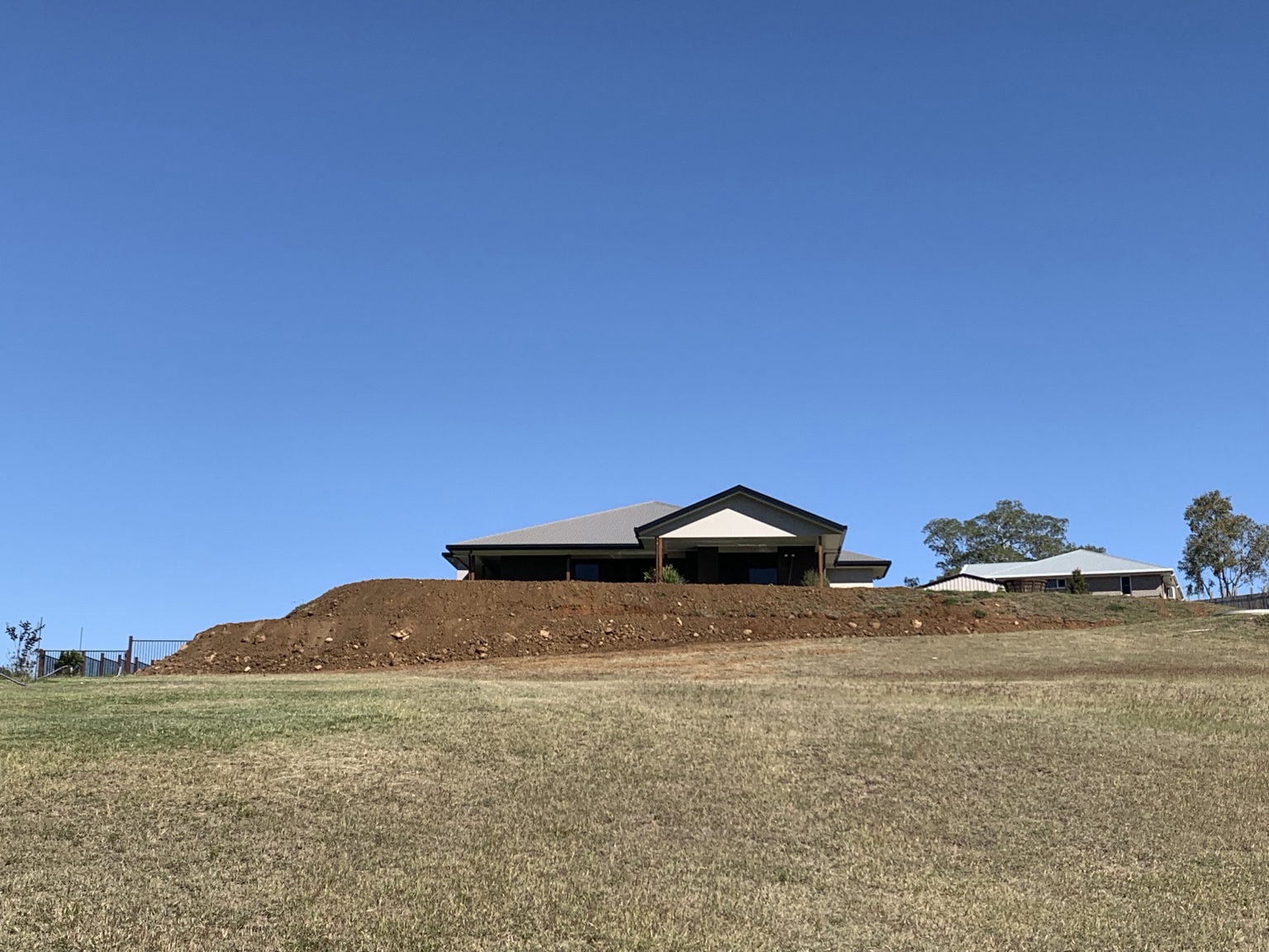 Prepared building pad on a sloping rural property