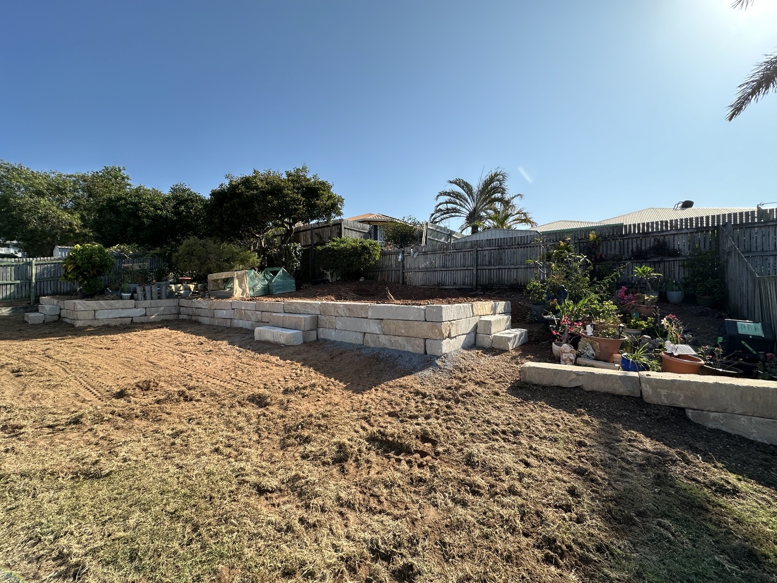 Finished terraced block retaining wall